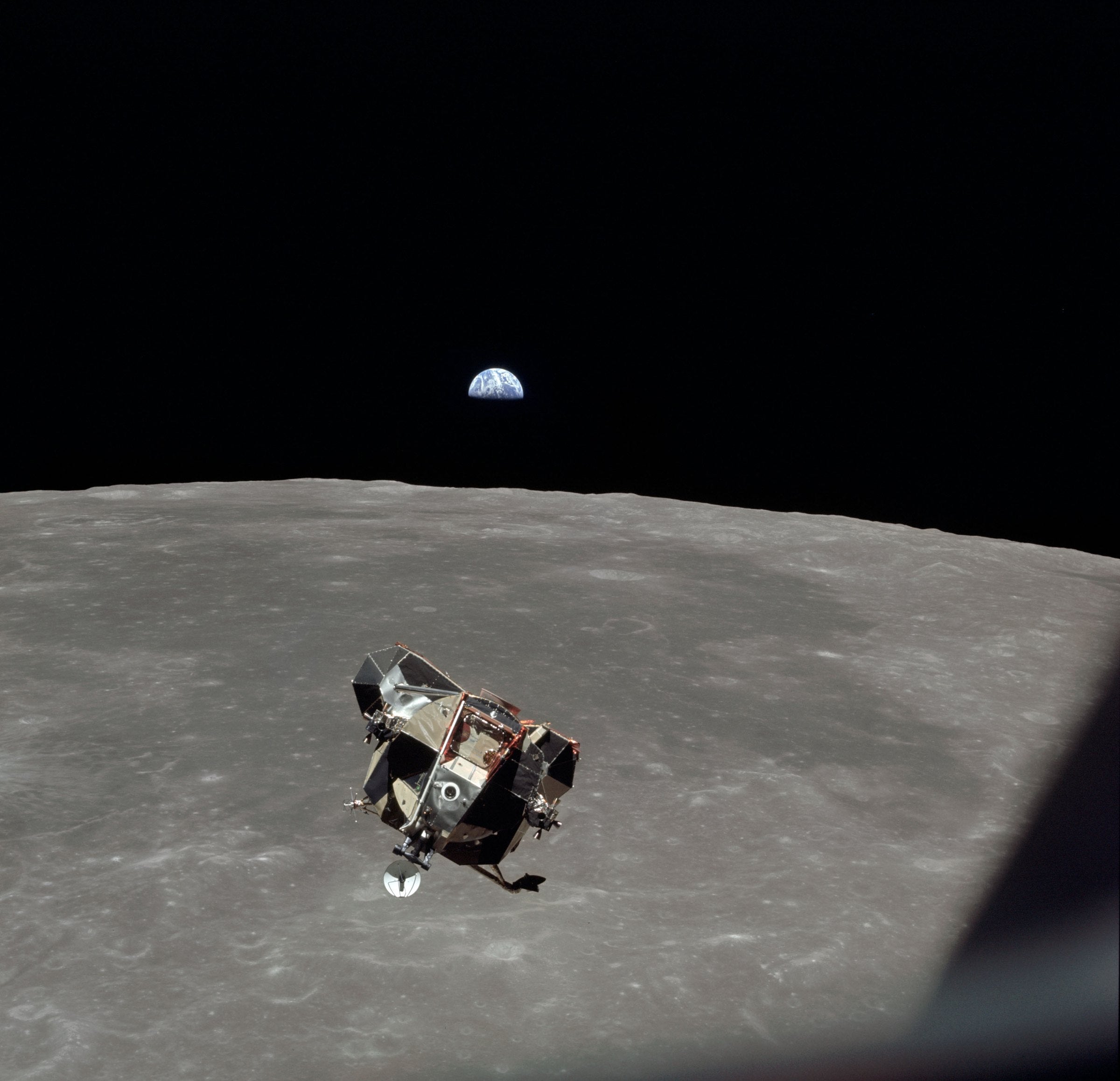 Apollo 11 Eagle over the Moon, Earth on the horizon