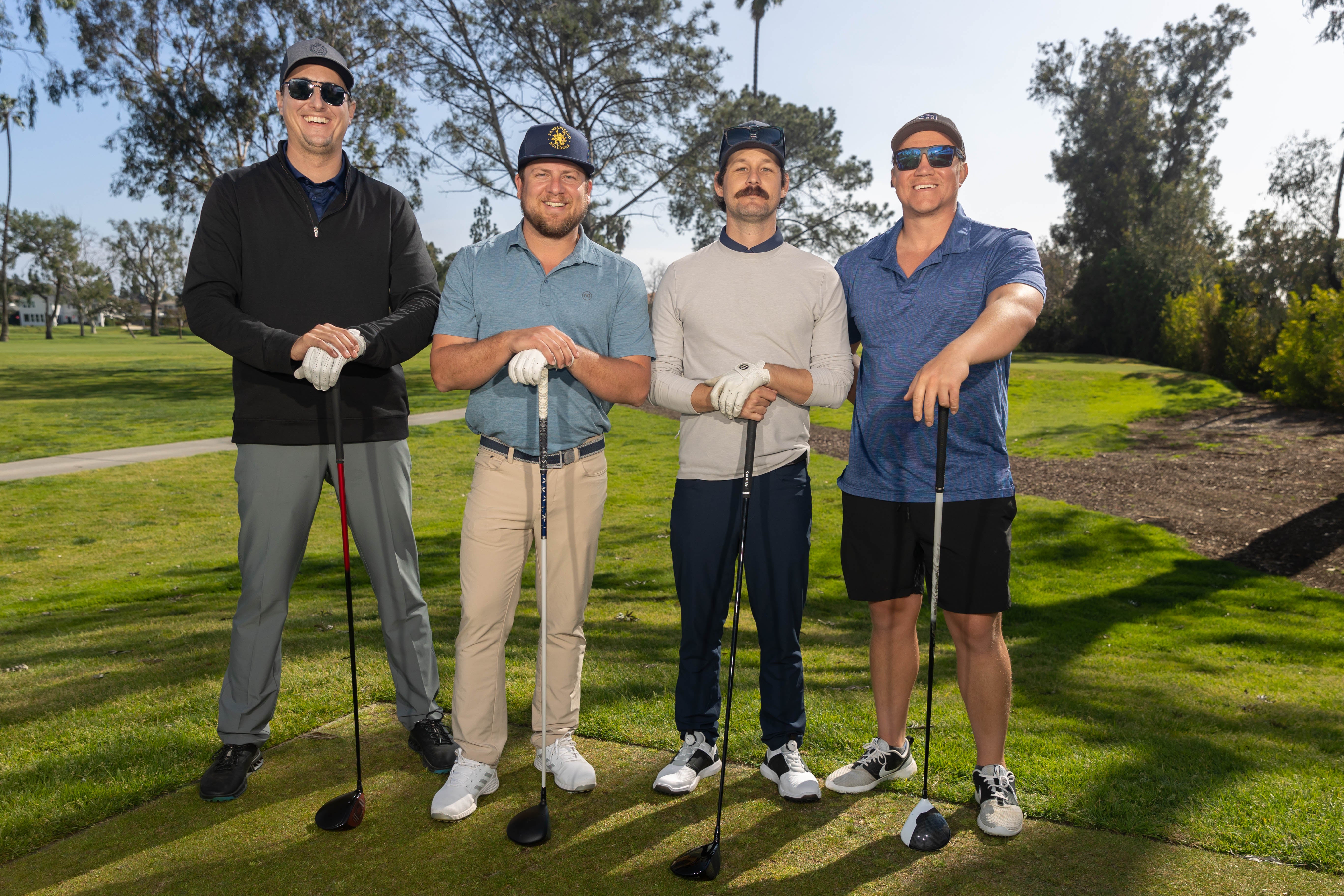 OC foursome on the tee